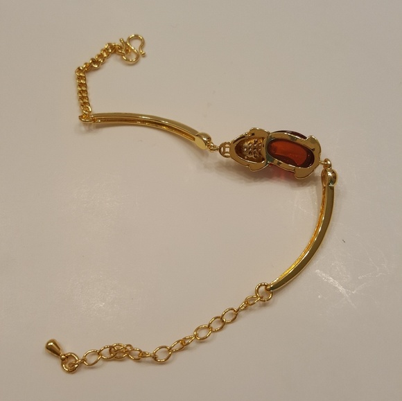 Bracelets gold plated metal with red stone. - Picture 3 of 7